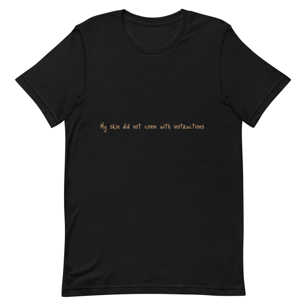 Short-Sleeve Unisex "My skin did not come with instructions." T-Shirt (Tan Lettering)