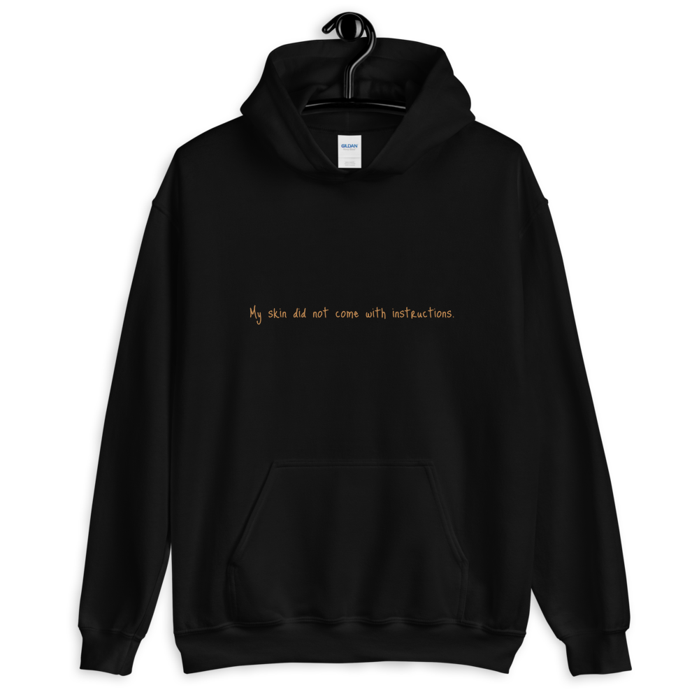 Unisex "My skin did not come with instructions." Hooded Sweatshirt (Tan Lettering)