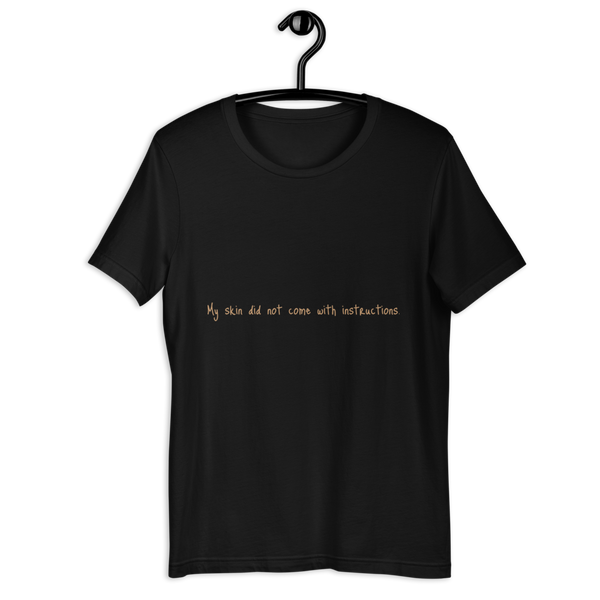 Short-Sleeve Unisex "My skin did not come with instructions." T-Shirt (Tan Lettering)