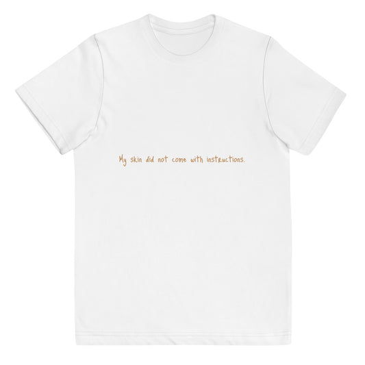 Unisex Youth Short Sleeve "My skin did not come with instructions." Tee (Tan Lettering)